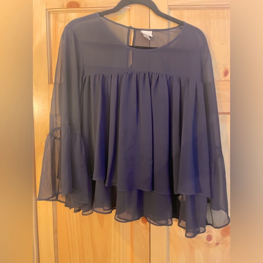 Dark blue lightweight flowy top.